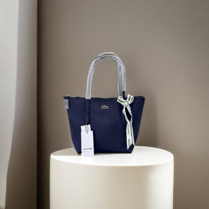 شنط يد نسائية لاكوست 2024